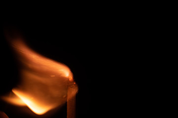 Ignition of match with sparks isolated on black background space for text fire concept passion figures variety
