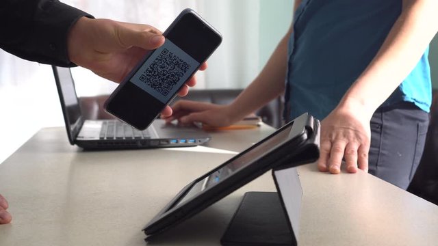 QR code Shipping Label For Delivery on the client's smartphone screen. Payment for parcels by QR code