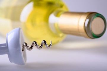 Bottle of wine with corkscrew