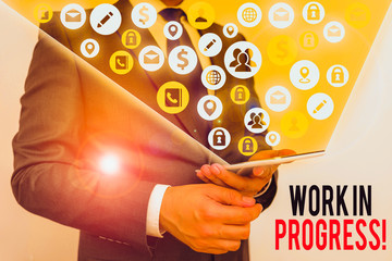Text sign showing Work In Progress. Business photo showcasing unfinished project that still added...