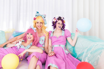Obraz na płótnie Canvas Pinup girls with colorful outfits.