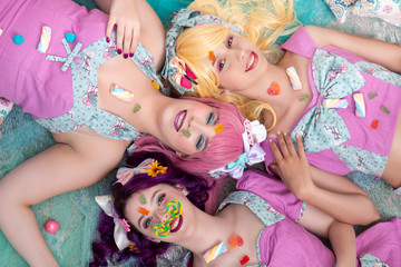 Pinup girls with colorful outfits.