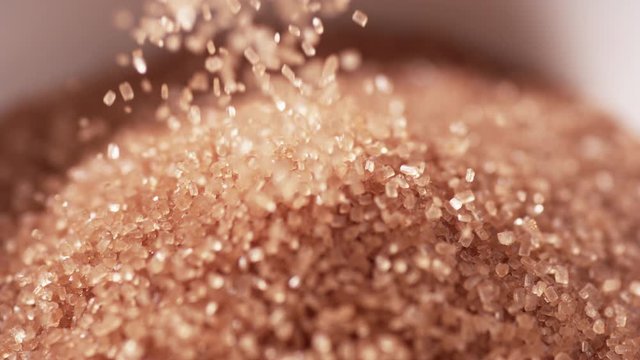 A pile of brown sugar. Slow Motion. 
