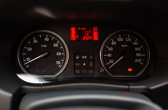 Speedometer and tachometer on a car panel