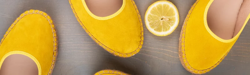 Fotobehang Banner of Yellow espadrilles shoes with lemon. © bondarillia
