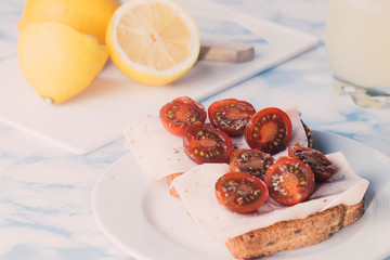 Healthy lunch based on toast with turkey ham.