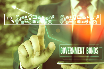 Handwriting text Government Bonds. Conceptual photo debt security issued by a government to support...