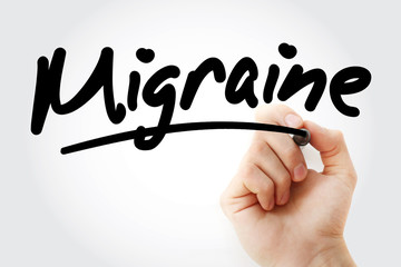 Migraine text with marker, health concept background