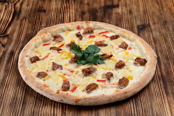 Italian baked pizza with melted cheese, chorizo pizza and crunchy crust on wooden table