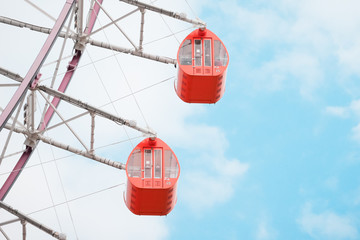 Ferris Wheel Over Blue Sky Background