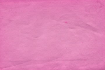 Cardboard pink abstract pattern texture close-up. Retro old paper background. Grunge concrete wall. Vintage blank wallpaper.