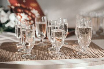 close up. glasses of champagne on the holiday table.