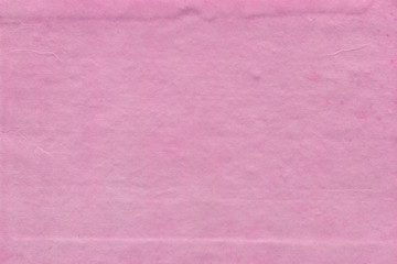 Cardboard pink abstract pattern texture close-up. Retro old paper background. Grunge concrete wall. Vintage blank wallpaper.