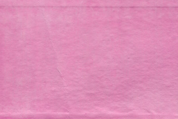 Fototapeta premium Cardboard pink abstract pattern texture close-up. Retro old paper background. Grunge concrete wall. Vintage blank wallpaper.