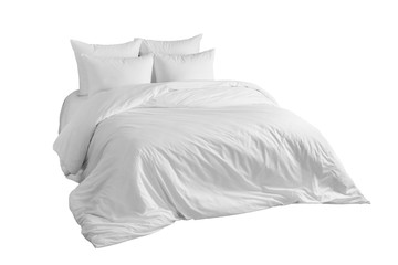 Bed with white bedlinen Isolated on white background. Side view.