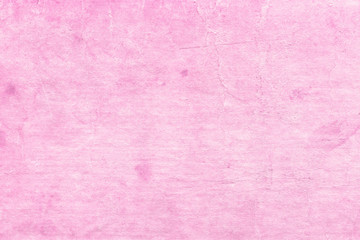 Cardboard pink abstract pattern texture close-up. Retro old paper background. Grunge concrete wall. Vintage blank wallpaper.
