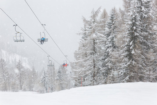 Skiers in the chair lift of Maibrunnbahn, Bad Kleinkirchheimm, Carinthia, Austria, Europe