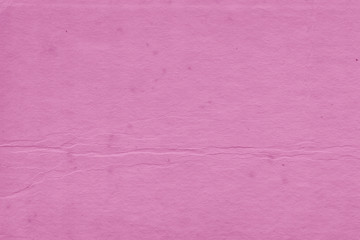 Cardboard pink abstract pattern texture close-up. Retro old paper background. Grunge concrete wall. Vintage blank wallpaper.