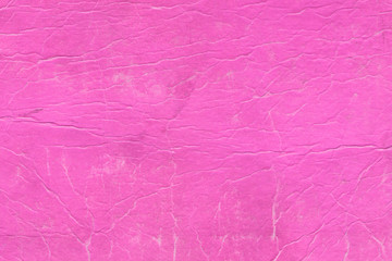 Cardboard pink abstract pattern texture close-up. Retro old paper background. Grunge concrete wall. Vintage blank wallpaper.