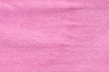 Fototapeta premium Cardboard pink abstract pattern texture close-up. Retro old paper background. Grunge concrete wall. Vintage blank wallpaper.