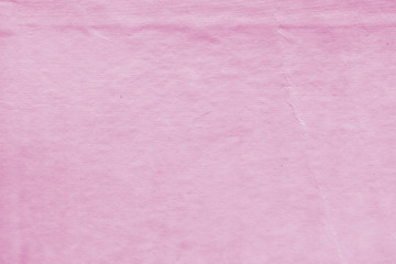 Cardboard pink abstract pattern texture close-up. Retro old paper background. Grunge concrete wall. Vintage blank wallpaper.