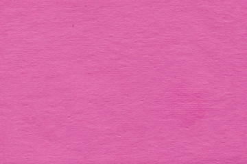Fototapeta premium Cardboard pink abstract pattern texture close-up. Retro old paper background. Grunge concrete wall. Vintage blank wallpaper.