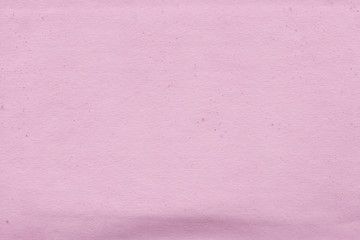 Cardboard pink abstract pattern texture close-up. Retro old paper background. Grunge concrete wall. Vintage blank wallpaper.