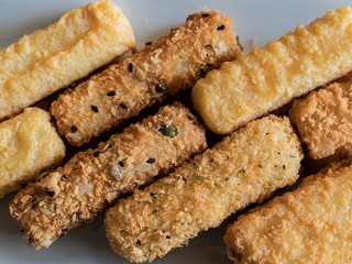  breaded fish on a white background