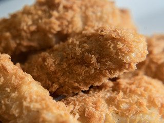  breaded fish on a white background