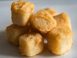  breaded fish on a white background