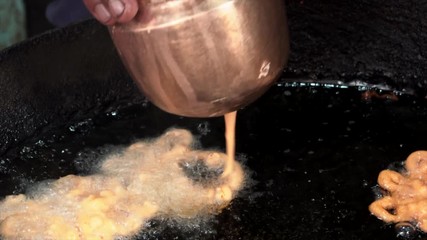 Making the famous jalebi sweets in a market in Nepal.