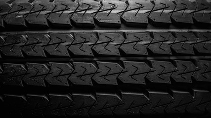 car tire, close-up tread, top view, monochrome image