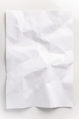 White crumpled paper on a white background. crumpled mocap paper