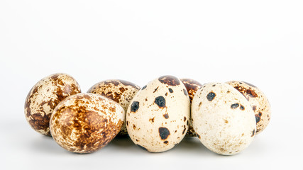 Quail egg on white background. Food, healthy product, animal welfare