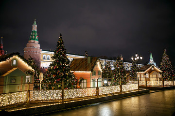 Moscow, Russia. Christmas decorations, houses on the background of the Moscow Kremlin - 317001391