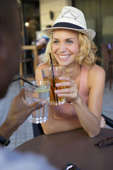 young people are drinking outdoors