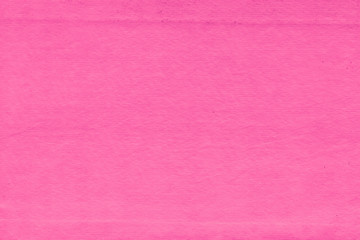 Fototapeta premium Cardboard pink abstract pattern texture close-up. Retro old paper background. Grunge concrete wall. Vintage blank wallpaper.