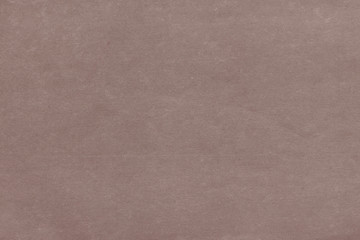 Fototapeta premium Cardboard pink abstract pattern texture close-up. Retro old paper background. Grunge concrete wall. Vintage blank wallpaper.