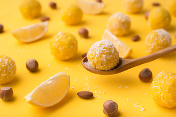 Healthy organic energy granola bites with lemon, nuts and honey - vegan vegetarian raw snack or meal