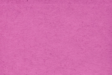 Fototapeta premium Cardboard pink abstract pattern texture close-up. Retro old paper background. Grunge concrete wall. Vintage blank wallpaper.