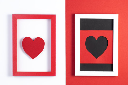 Valentines day card. Creative Valentine Day romantic composition with photo frame. Trendy minimal style. Valentines day card with copy space. Top view, Flat lay.