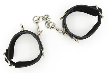 leather handcuffs in white background