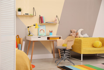 Stylish child room interior with modern furniture