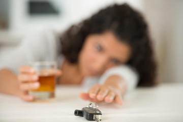 whisky glass with car keys
