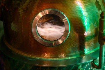 Gin distillation process in copper tanks, Scotland, UK