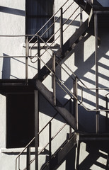 Naklejka premium staircase on building with shadows