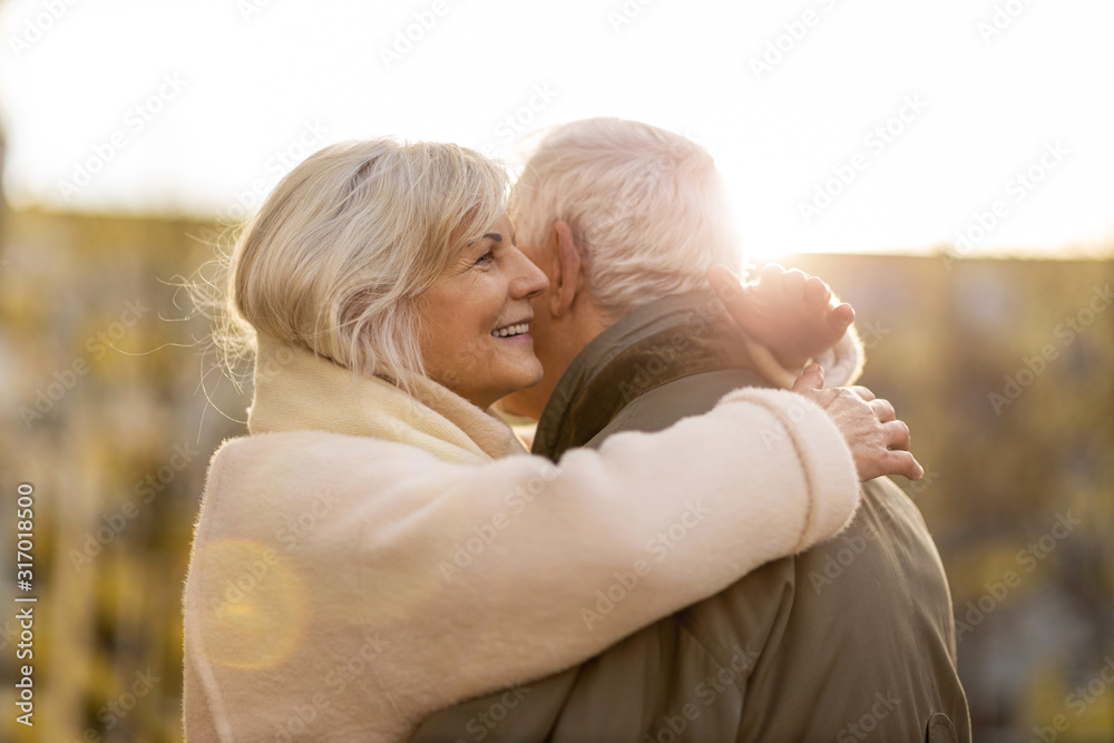 Canvas Prints senior couple hugging outdoors in autumn