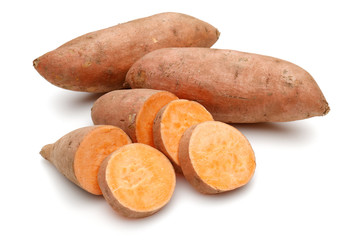 Sweet potatoes with slices isolated on white background
