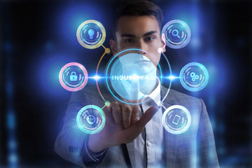 Fototapeta premium Business, Technology, Internet and network concept. Young businessman working on a virtual screen of the future and sees the inscription: