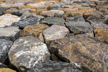 Close up of rough cut stone wall, Background.